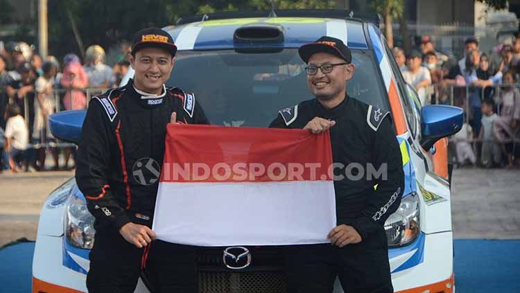 Pereli Indonesia, Rihan Variza bersama navigatornya Andi Rendy. Copyright: © Aldi Aulia Anwar/INDOSPORT