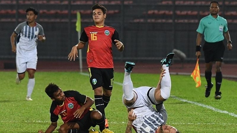Pesepak bola timnas Timor Leste U-19, Gali Da Costa Freitas, sempat dituduh melakukan pencurian umur ketika tampil di ajang Piala AFF U-15 edisi 2019. Copyright: © MOHD RASFAN/AFP/Getty Images