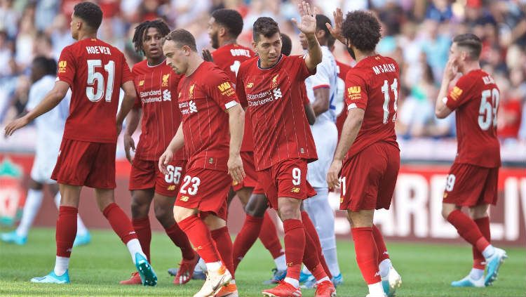 Selebrasi para pemain Liverpool saat mencetak gol ke gawang Lyon, Kamis (01/08/19) dini hari WIB. Copyright: © Liverpool