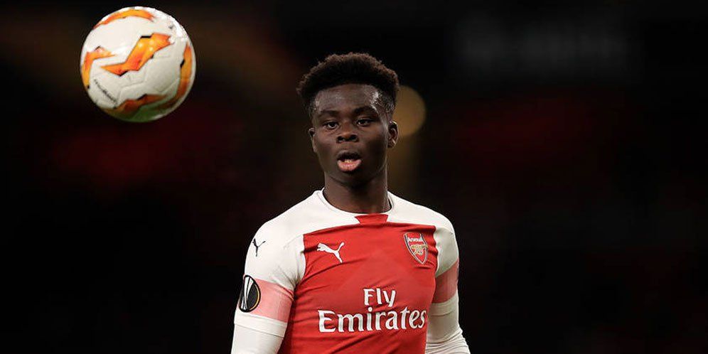 Arsenal kemungkinan besar telah berhasil menemukan The Next Robert Pires dalam sosok wonderkid baru andalan mereka, Bukayo Saka. Copyright: © Getty Images