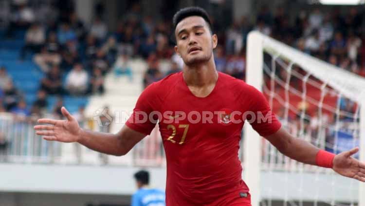 Striker Timnas U-22, Muhammad Rafli berselebrasi usai mencetak gol ke gawang PSIM Yogyakarta. Copyright: © Ronald Seger Prabowo/INDOSPORT