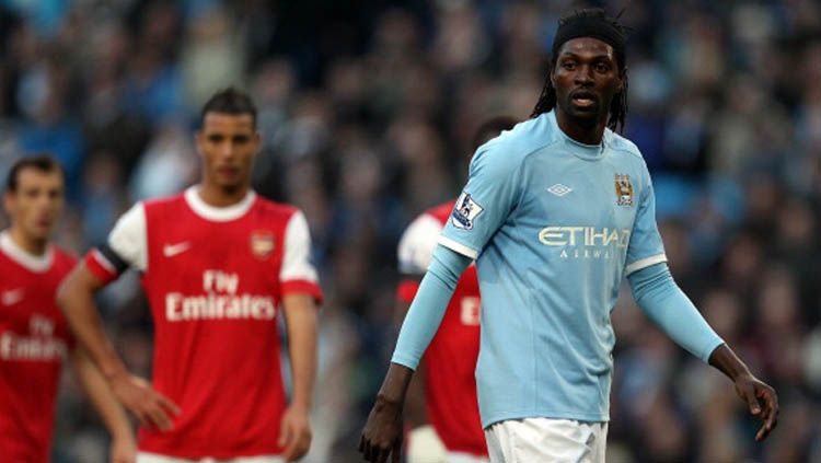 Striker Manchester City, Emmanuel Adebayor (kanan) saat melawan mantan klubnya, Arsenal pada tahun 2009 lalu Copyright: © Richard Heathcote/GettyImages