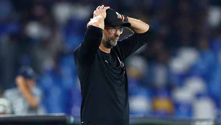 Pelatih Liverpool, Jurgen Klopp meunjukan ekspresi yang tak mengenakan usai timnya dikalahkan Napoli. Copyright: © Matteo Ciambelli/NurPhoto via Getty Images