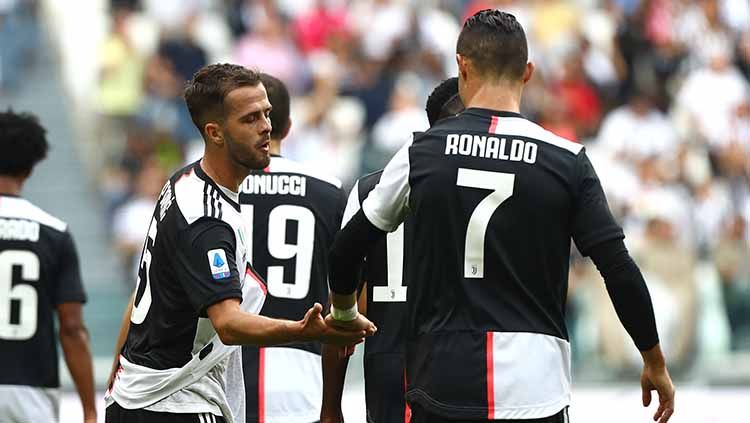 Miralem Pjanic ingin membawa Juventus meraih semua gelar juara musim ini. Copyright: © Marco Luzzani/Getty Images