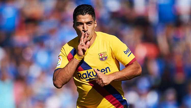 Luis Suarez melakukan selebrasi pada menit ke-41'. Copyright: © Aitor Alcalde/Getty Images