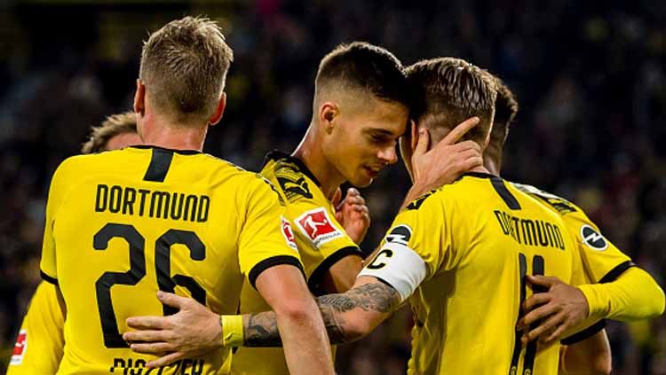 Pemain Borussia Dortmund, Thorgan Hazard, kabarnya siap menggunakan taktik 'Yellow Wall' atau untuk menghadapi Inter Milan di Liga Champions. Copyright: © Alexander Simoes/GettyImages