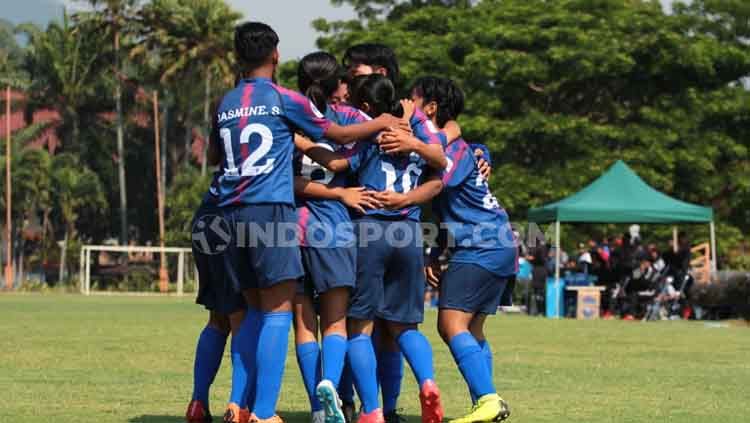 Selebrasi kemenangan Arema putri atas Bali United. Copyright: © Ian Setiawan/INDOSPORT
