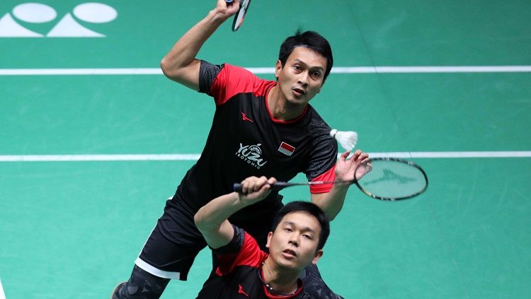 Pasangan ganda putra Indonesia, Mohammad Ahsan/Hendra Setiawan harus rela menerima kenyataan usai tersingkir di babak ketiga Fuzhou China Open 2019. Copyright: © PBSI