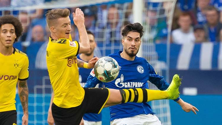 Laga Schalke vs Dortmund harus puas dengan skor akhir 0-0 dalam lanjutan Bundesliga, Sabtu (26/10/19). Copyright: © TF-Images/Getty Images