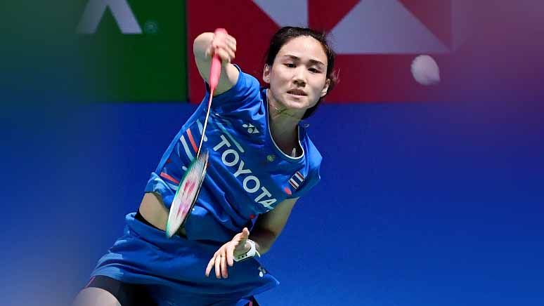 Turnamen bulutangkis Thailand Masters 2023 diwarnai dengan sihir kecantikan pelatih asal tuan rumah, Nitchaon Jindapol, yang bikin salah fokus penonton. Copyright: © TOSHIFUMI KITAMURA/AFP/Getty Images
