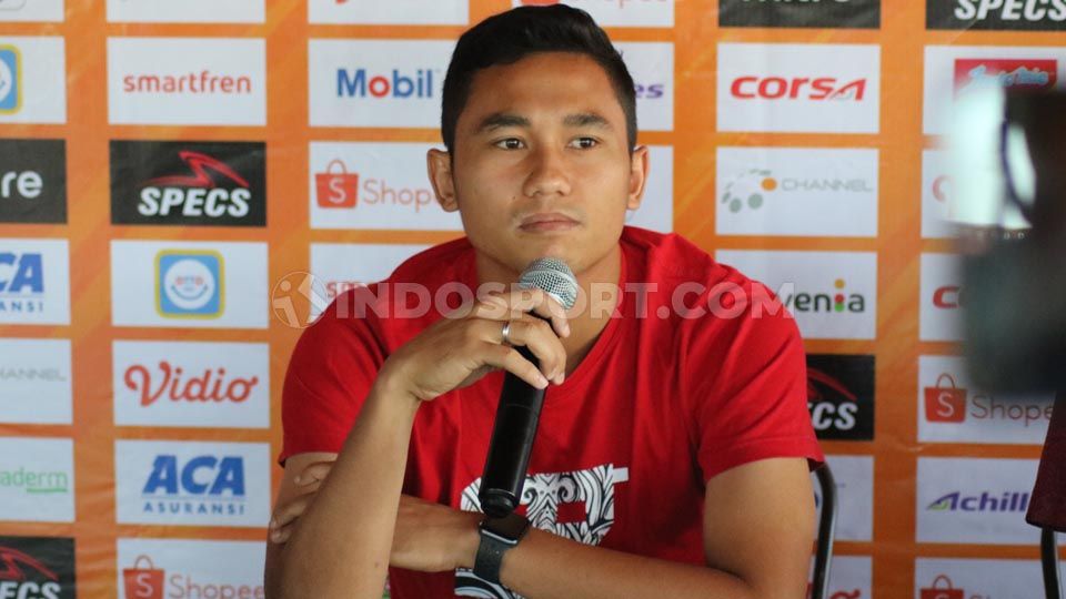 Bek Bali United, Ricky Fajrin, berharap kompetisi Liga 1 2020 bisa jalan sesuai protokol kesehatan yang ditetapkan. Copyright: © Nofik Lukman Hakim/INDOSPORT