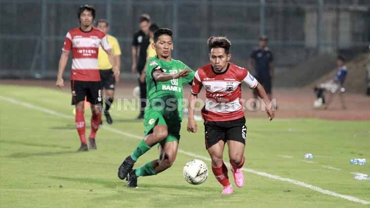Madura United dan Bhayangkara FC jadi dua dari banyak tim yang berpeluang lolos ke zona Asia melalui jalur runner-up liga. Copyright: © Ian Setiawan/INDOSPORT