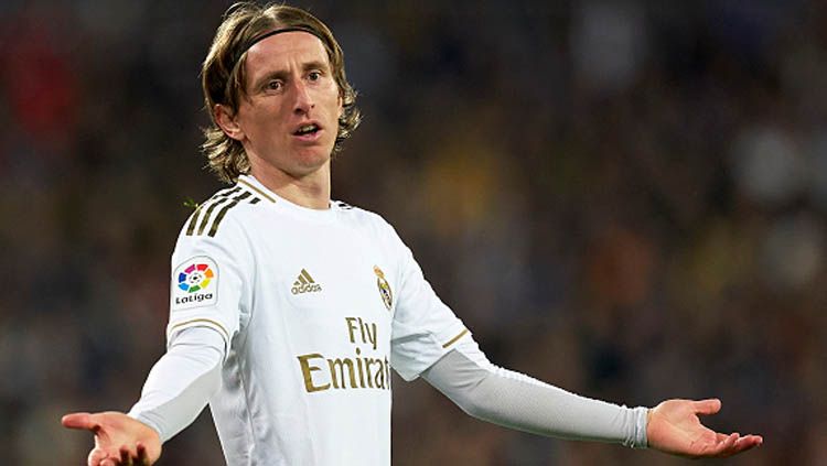 Luka Modric dikabarkan akan tetap bertahan di Real Madrid hingga kontraknya habis pada tahun 2021 mendatang. Copyright: © Quality Sport Images/GettyImages