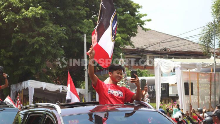 Winger Bali United, M Rian Firmansyah saat ikut dalam parade juara Liga 1 2019. Copyright: © Nofik Lukman Hakim/INDOSPORT