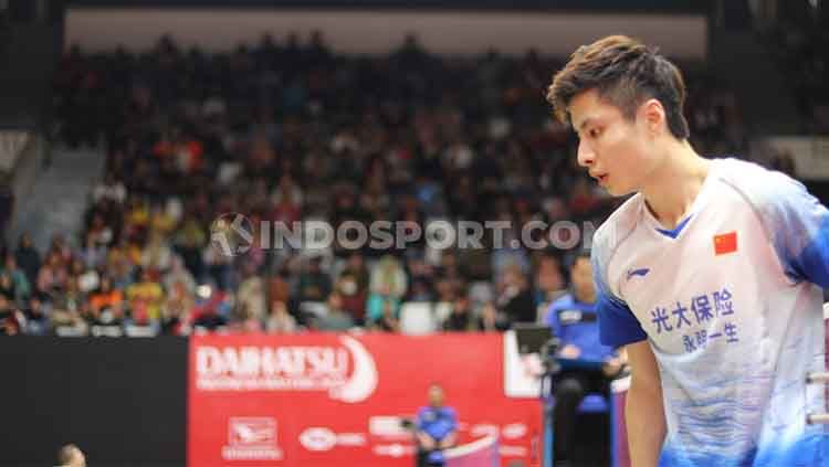 Pebulutangkis tunggal putra China, Shi Yuqi kalahkan Jonatan Christie di babak pertama Singapore Open 2023. Copyright: © Theresia Simanjuntak/INDOSPORT