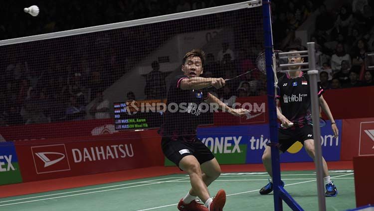 Pertarungan ganda putra terbaik Indonesia, Kevin Sanjaya/Marcus Gideon, melawan Aaron Chia/Soh Wooi Yik di Semifinal Indonesia Masters 2020 Copyright: © Herry Ibrahim/INDOSPORT