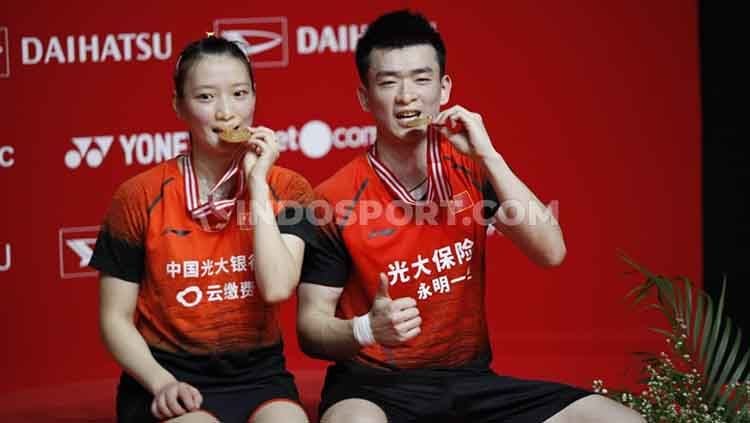 Pebulutangkis ganda campuran ranking dua asal China, Zheng Siwei/Huang Yaqiong resmi bercerai di German Open 2022 dan akan debut dengan pasangan anyar. Copyright: © Herry Ibrahim/INDOSPORT