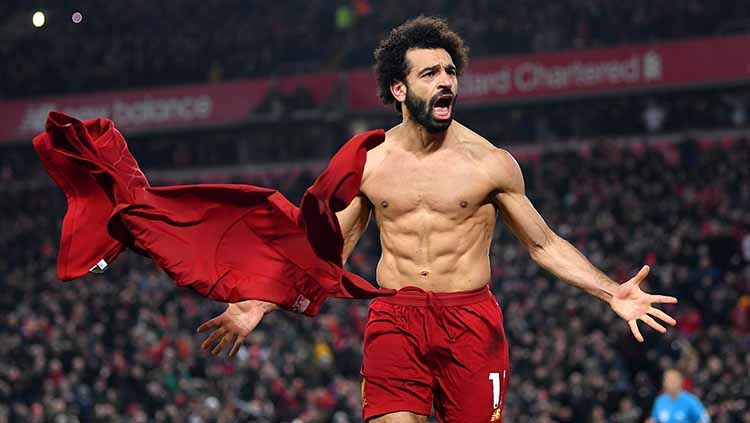 Mohamed Salah mengatakan bahwa Liverpool sempat pecah dua kubu jelang perayaan juara Liga Inggris mereka. Copyright: © Michael Regan/Getty Images