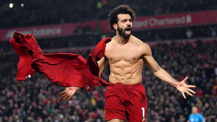 Mohamed Salah berselebrasi usai mencetak gol ke gawang Man Untied, Minggu (19/01/20). Copyright: © Michael Regan/Getty Images