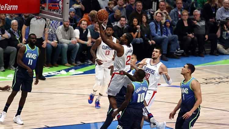 LA Clippers vs Dallas Mavericks di pertandingan NBA 2019-2020 pada bulan November lalu Copyright: © Ronald Martinez/GettyImages