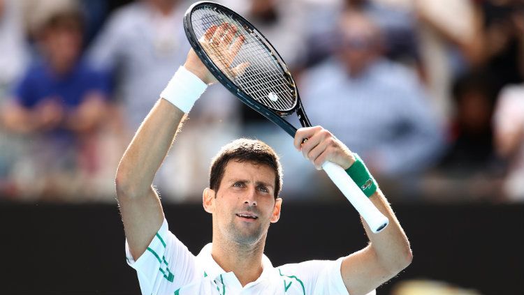 Novak Djokovic selebrasi usai menang mudah atas Yoshihito Nishioka, 6-3, 6-2, 6-2. Copyright: © Hannah Peters/Getty Images