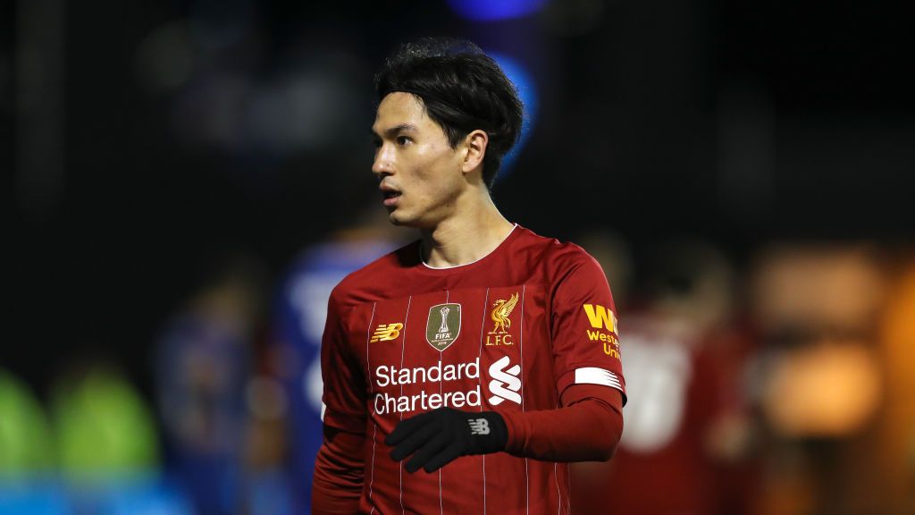 Takumi Minamino jadi salah satu bintang Liverpool saat melawan Crystal Palace. Copyright: © Matthew Ashton - AMA/Getty Images