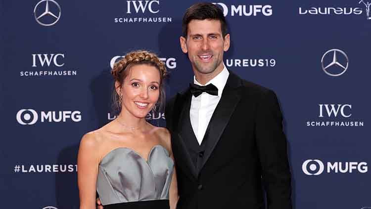 Novak Djokovic bersama sang istri, Jelena. Copyright: © Boris Streubel/Getty Images for Laureus