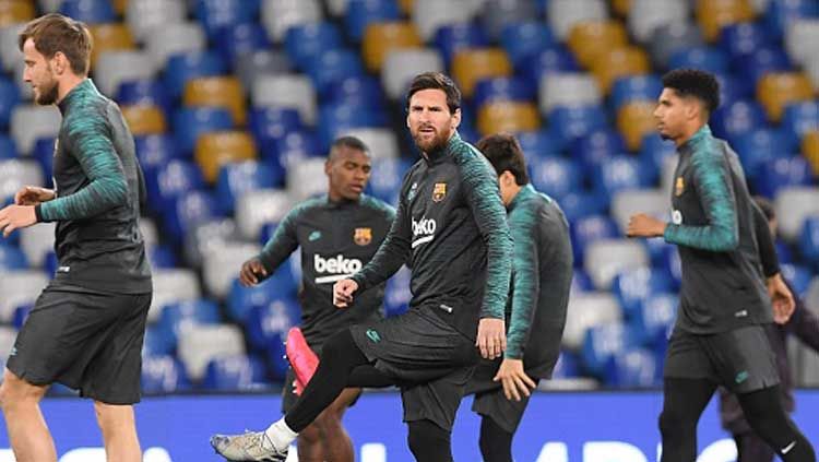 Megabintang Barcelona, Lionel Messi, tak termasuk pemain yang mendapat standing ovation di kandang Real Madrid. Copyright: © Ciro Sarpa/Getty Images