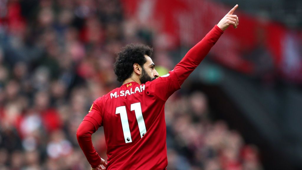 Mohamed Salah melakukan selebrasi usai mencetak gol di laga Liverpool vs Bournemouth Copyright: © Jan Kruger/Getty Images