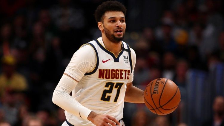 Bintang Denver Nuggets, Jamal Murray sangat percaya diri bahwa timnya bisa menjuarai NBA musim 2019/2020 karena ada sosok Nikola Jokic. Copyright: © Jamie Schwaberow/Getty Images