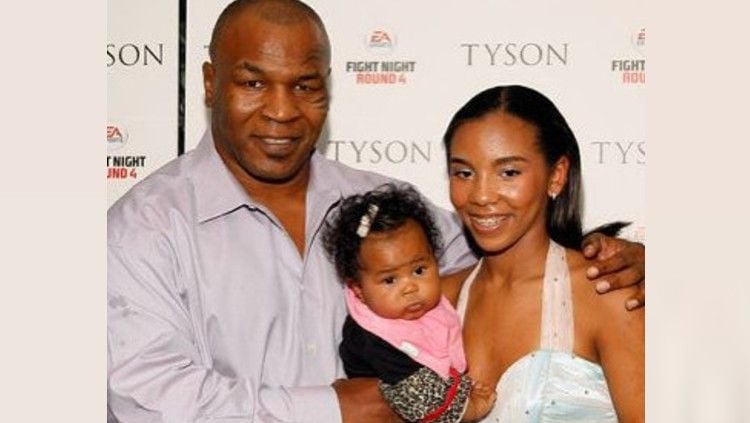 Mike Tyson bersama mendiang putrinya, Exodus. Copyright: © Zimbio
