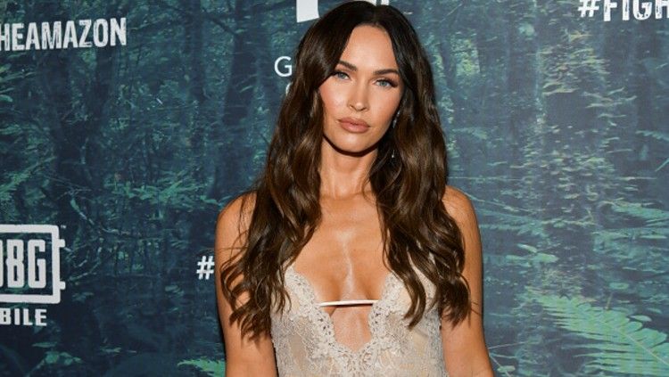 Megan Fox mengaku tak bisa lupa momen pemotretan pakaian dalam bersama Ronaldo. Copyright: © Photo by Rodin Eckenroth/Getty Images