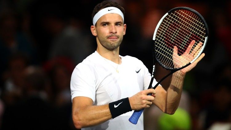 Grigor Dimitrov, petenis asal Bulgaria alami cedera punggung di Australian Open 2021. Copyright: © Dean Mouhtaropoulos/Getty Images