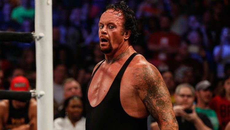 WWE dikabarkan sedang menyiapkan pertarungan perpisahan terhadap salah satu legenda mereka, The Undertaker. Copyright: © JP Yim/Getty Images