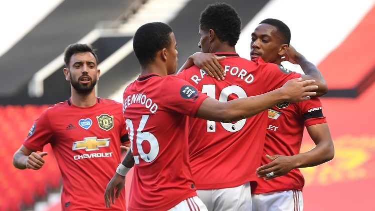 Perayaan gol Anthony Martial dalam pertandingan Liga Inggris antara Manchester United vs Sheffield, Kamis (25/06/20). Copyright: © Michael Regan/Getty Images