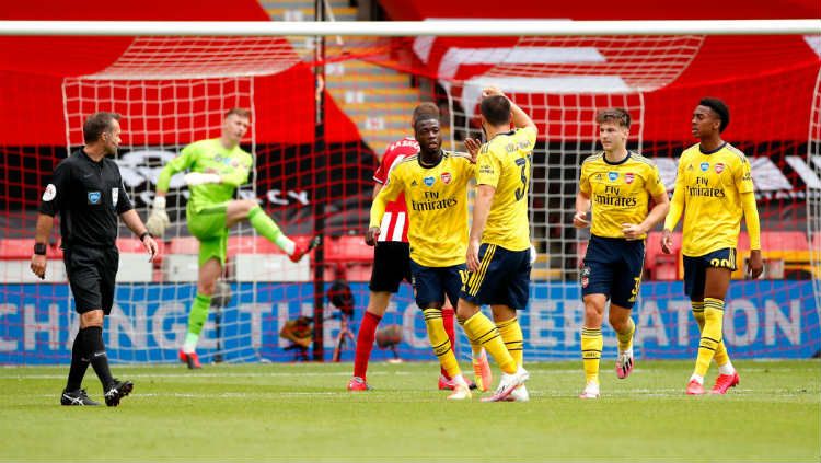 Selebrasi gol Nicolas Pepe di laga Sheffield United vs Arsenal. Copyright: © Andrew Boyers/Pool via Getty Images
