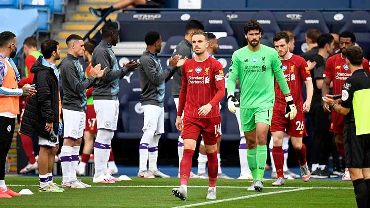 Jurgen Klopp menegaskan bahwa Liverpool tidak berfokus untuk memecahkan rekor milik Manchester City usai memastikan diri menjadi juara Liga Inggris 2019-2020. Copyright: © Getty images