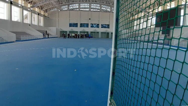 Salah satu venue PON XX Papua yang sudah rampung, Lapangan Hoki Indoor hanya tinggal menanti proses sertifikasi. Copyright: © Sudjarwo/INDOSPORT