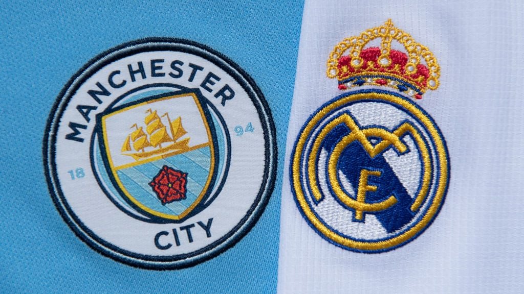Logo Manchester City dan Real Madrid Copyright: © Visionhaus via Getty Images