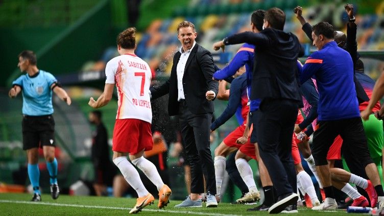 Pelatih RB Leipzig, Julian Nagelsmann, tak mau terburu-buru untuk tak merayakan kelolosan mereka ke babak semifinal Liga Champions setelah mengalahkan Atletico. Copyright: © Twitter @DieRotenBullen