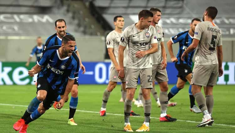 Danilo D'Ambrosio rayakan golnya kontra Shakhtar Donetsk pada semifinal Liga Europa 2019/20 antara Inter Milan vs Shakhtar Donetsk, Selasa (18/08/20) WIB. Copyright: © Lars Baron/Getty Images