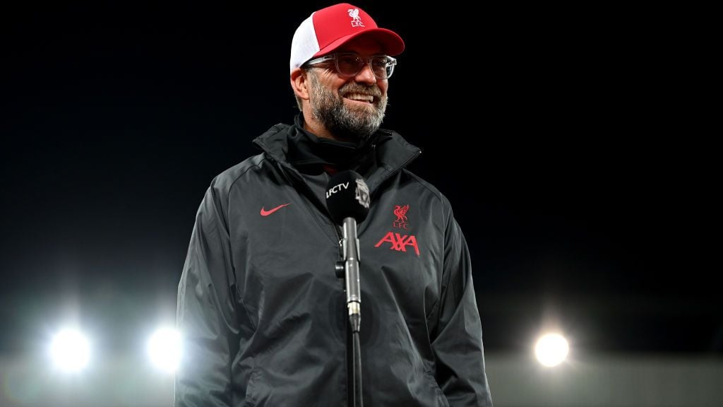 Jurgen Klopp dan Liverpool sepakat untuk melanjutkan kerja sama dengan kontrak baru hingga Juni 2026 dan terus menjadi manajer aktif paling setia Liga Inggris. Copyright: © Shaun Botterill/Getty Images