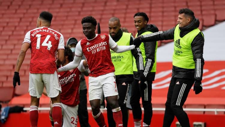 Bukayo Saka merayakan golnya dalam pertandingan Liga Inggris antara Arsenal vs Sheffield United, Minggu (04/02/20) Copyright: © Kirsty Wigglesworth - Pool/Getty Images