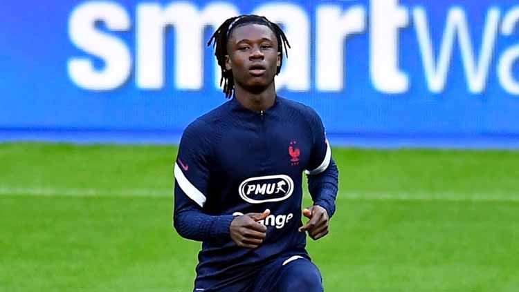 Manchester United memiliki kesempatan menikung Real Madrid dalam perburuan untuk mendapatkan bintang muda Prancis, Eduardo Camavinga. Copyright: © Aurelien Meunier/Getty Images