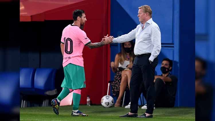 Lionel Messi didesak untuk tetap bertahan di Barcelona oleh Ronald Koeman meskipun mereka jadi ampas di Liga Champions. Copyright: © Getty Images