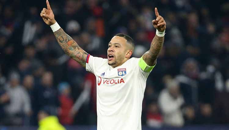 Memphis Depay menjadi pemain paling diburu jelang dibukanya bursa transfer menyusul ketertarikan dari Juventus dan Barcelona. Copyright: © Jean Catuffe/Getty Images