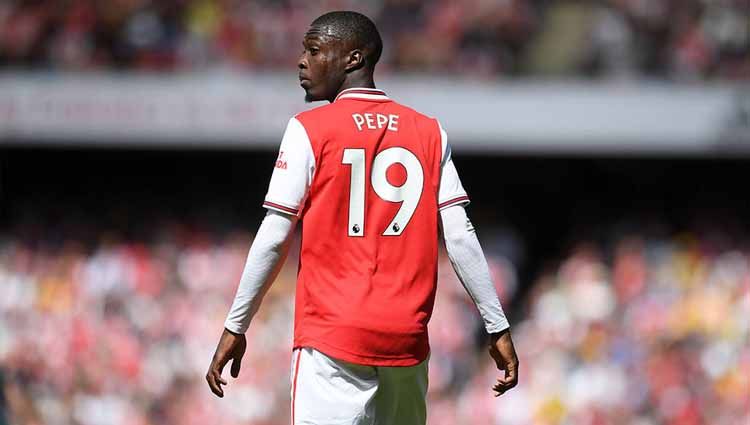 Nicolas Pepe mulai frustrasi di Arsenal akibat minimnya menit bermain. Mikel Arteta harus segera mencari solusi untuk mencegah bom waktu baru ini meledak. Copyright: © Twitter@NicolasPepe19_