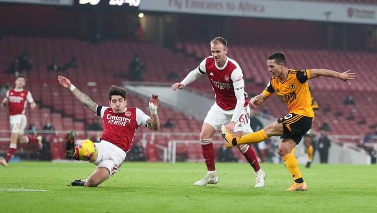 Pemain Wolves, Daniel Podence, mencetak gol ke gawang Arsenal pada pertandingan Liga Inggris, Senin (30/11/20) dini hari WIB. Copyright: © James Williamson - AMA/Getty Images