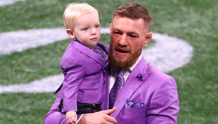 Conor McGregor dan putranya McGregor Jr. Copyright: © Rich Graessle/Icon Sportswire via Getty Images