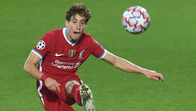 Kostas Tsimikas harus berjuang keras di klub Liga Inggris, Liverpool. Copyright: © John Powell/Liverpool FC via Getty Images